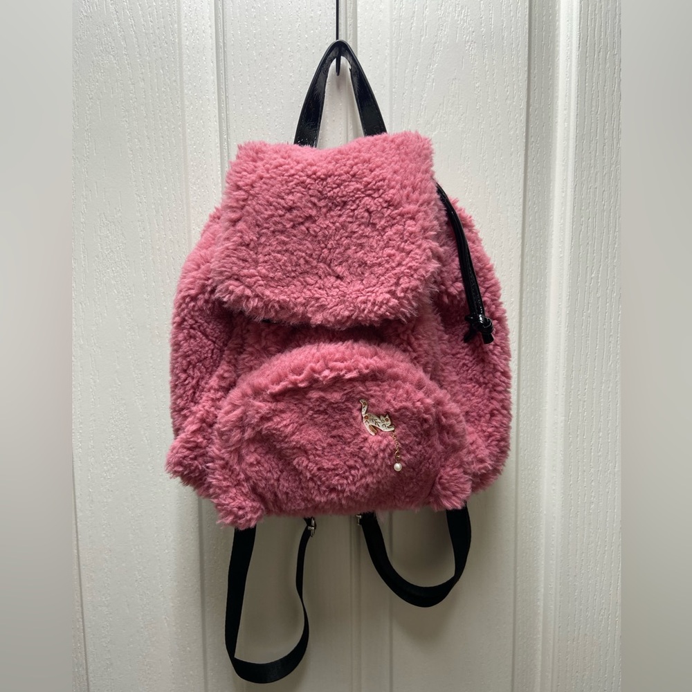 Skinny dip pink Sherpa mini backpack with Patton leather draw strings